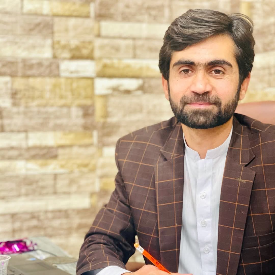 Portrait of Mr. Tariq Ahmad, Director